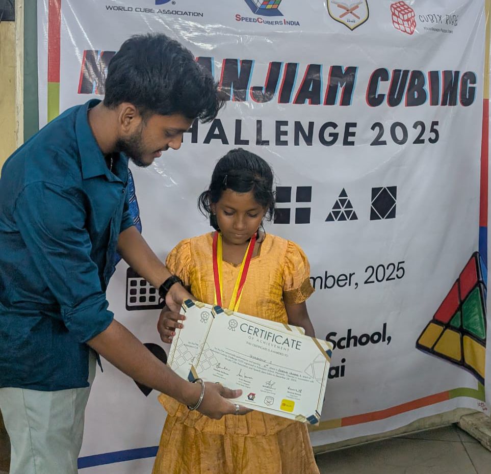 Tejaswini with her competition award